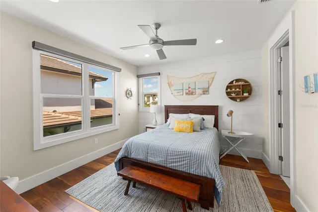 a living room with furniture a fireplace and a table