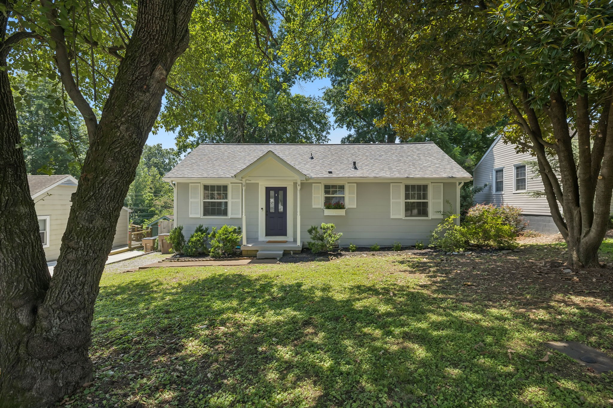 5415 Knob Road Nashville, TN 37209 - Photo 1 of 28 a front view of a house with a yard