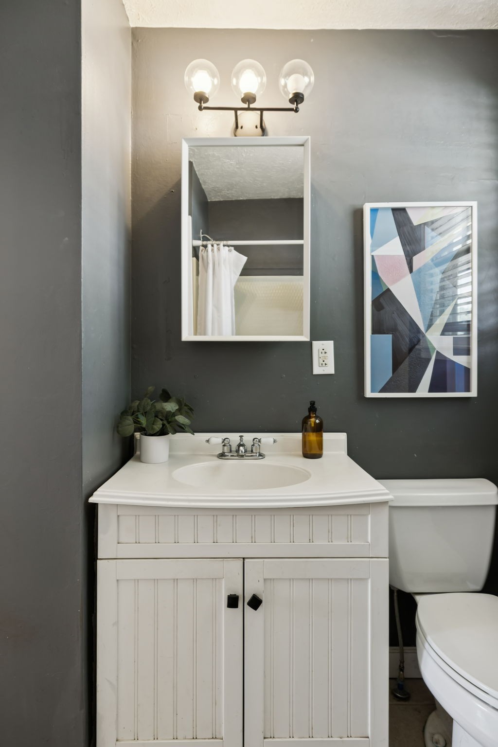5415 Knob Road Nashville, TN 37209 - Photo 13 of 28 a bathroom with a sink and a toilet