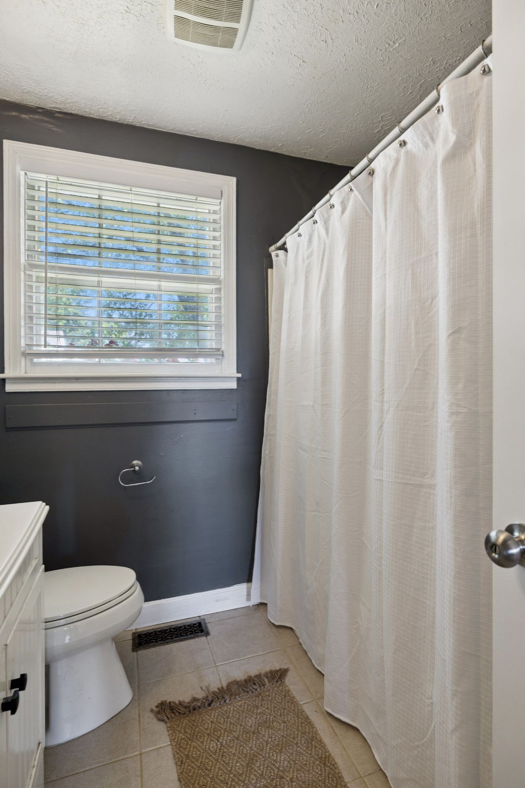 5415 Knob Road Nashville, TN 37209 - Photo 14 of 28 a bathroom with a sink and a toilet