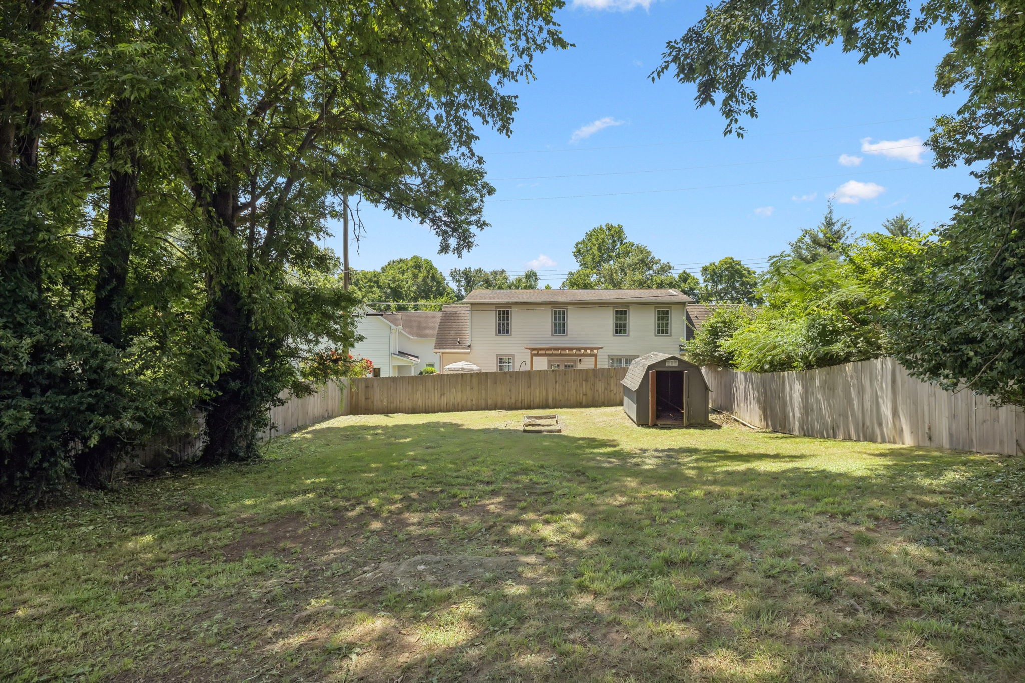 5415 Knob Road Nashville, TN 37209 - Photo 22 of 28 a view of a house with a yard