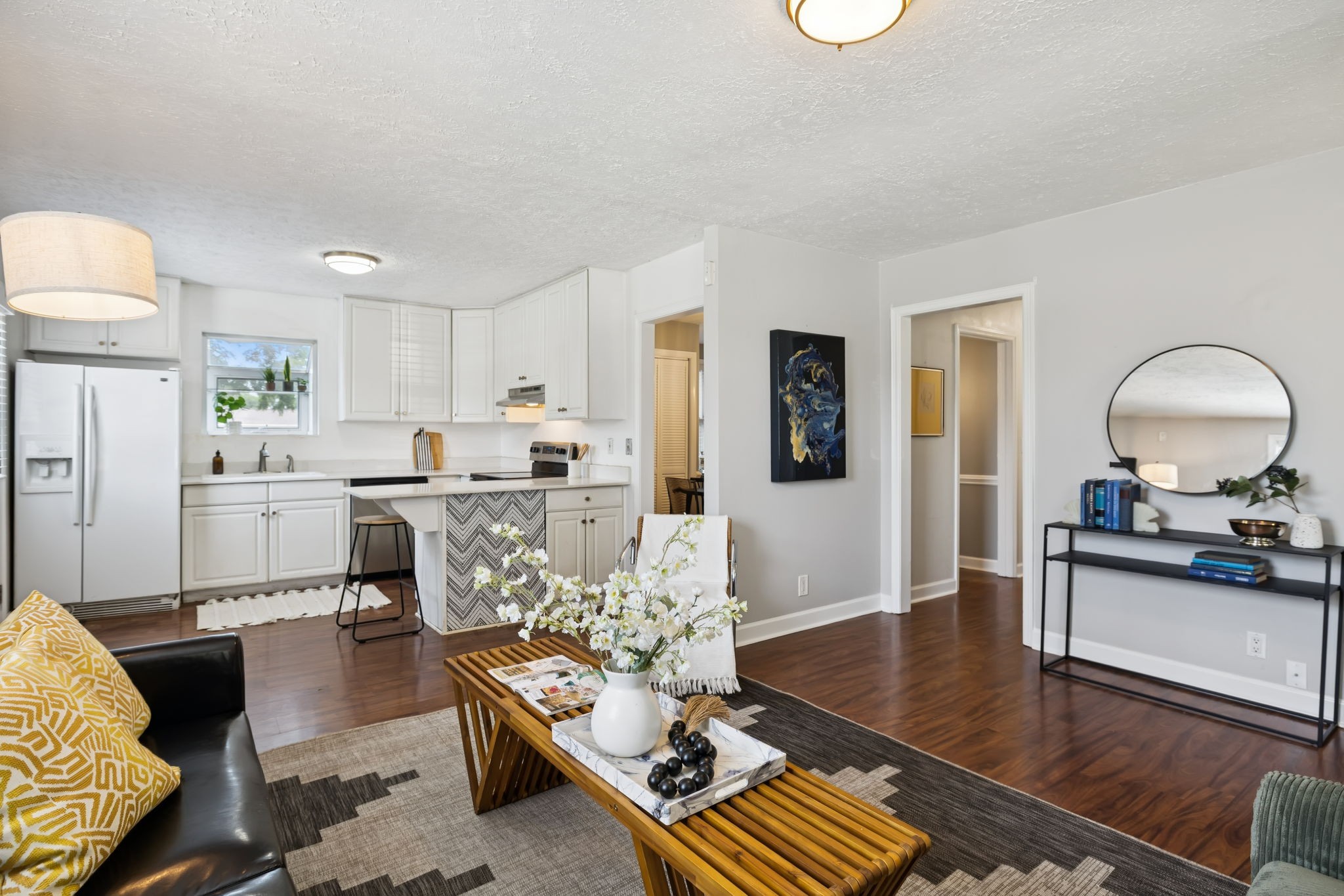 5415 Knob Road Nashville, TN 37209 - Photo 7 of 28 a living room with furniture and a dining table with kitchen view