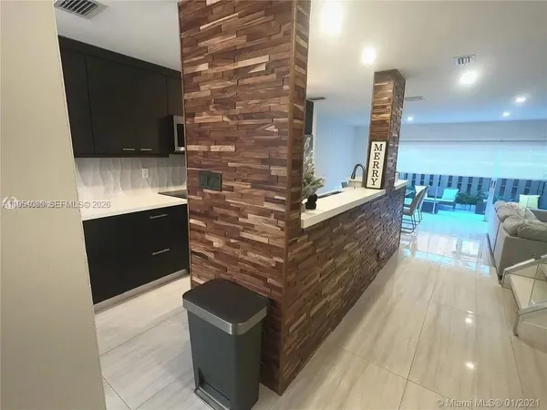 a view of a porch with furniture