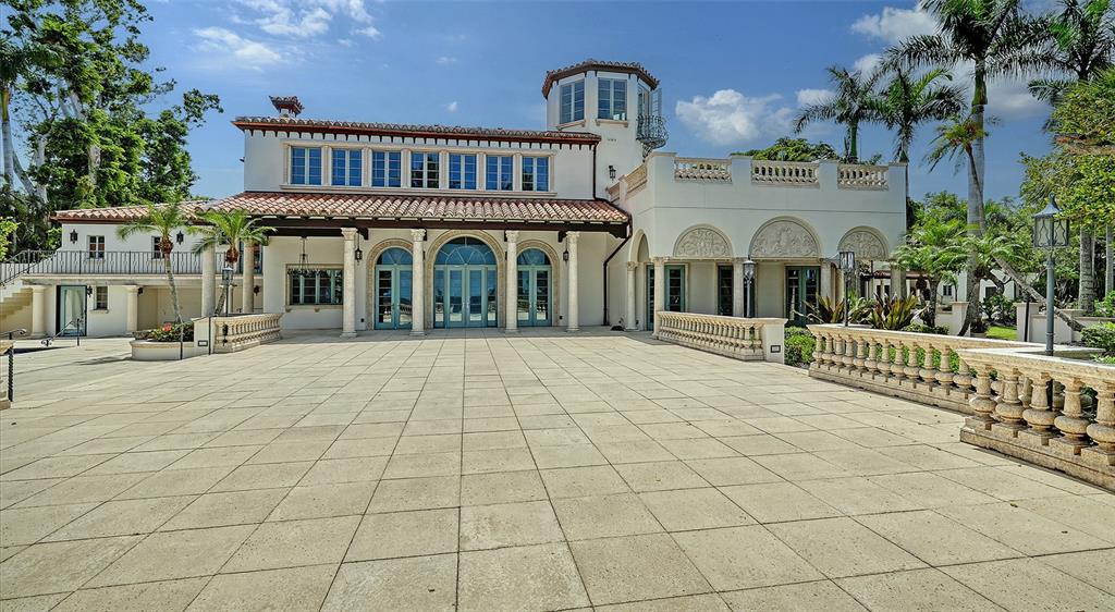 4423 Bay Shore Road Sarasota, FL 34234 - Photo 16 of 51 a view of a brick house with large windows