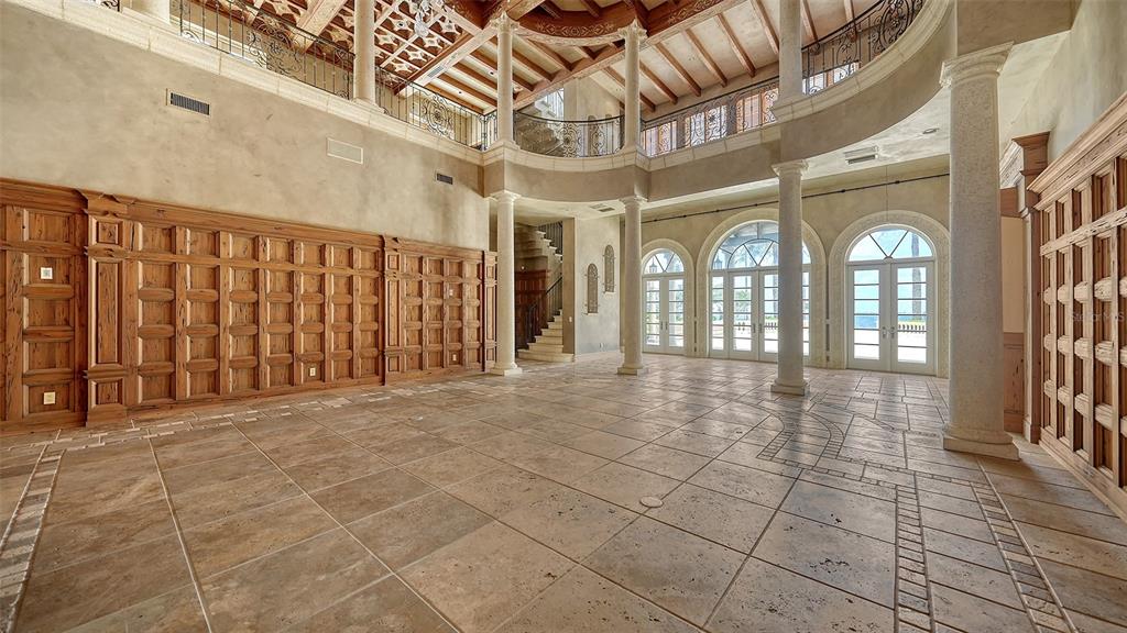 4423 Bay Shore Road Sarasota, FL 34234 - Photo 44 of 51 a view of entryway with stairs and wooden floor