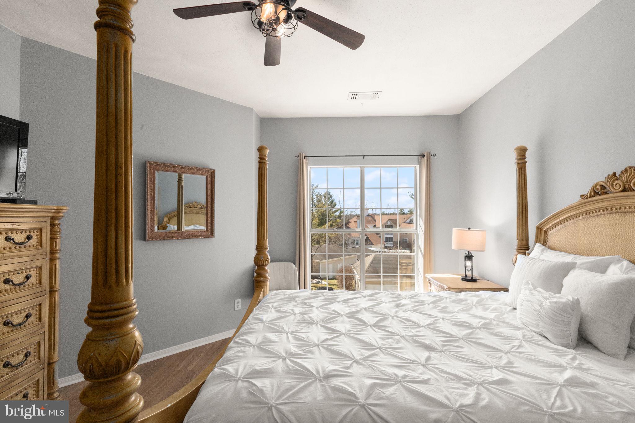 310 Canterbury Road Bel Air, MD 21014 - Photo 11 of 28 a bedroom with a bed and a chandelier