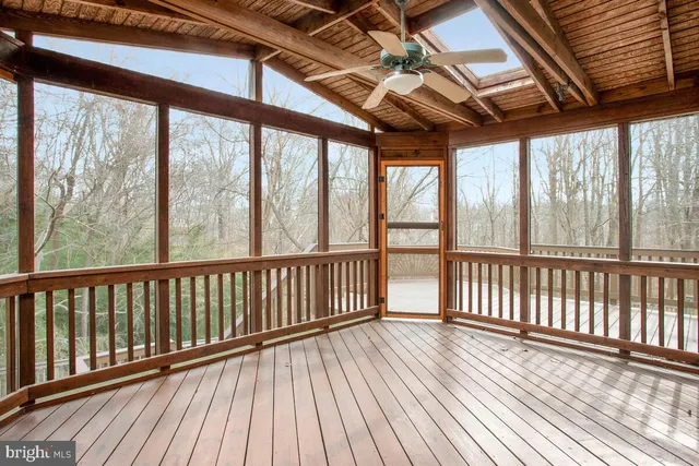 a view of wooden balcony with wooden floor