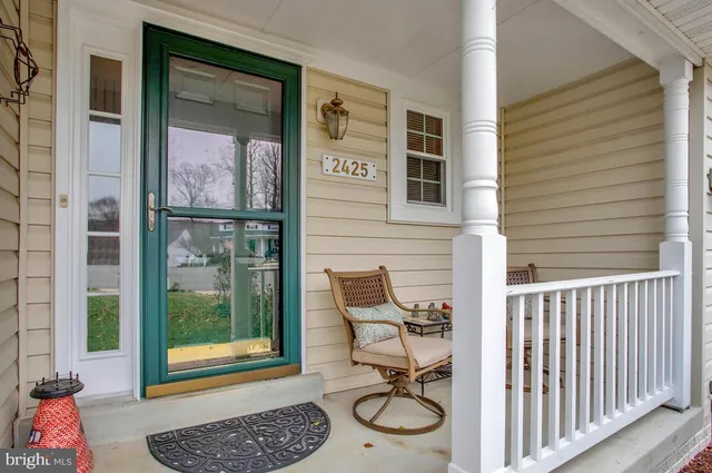 a view of a front door and deck