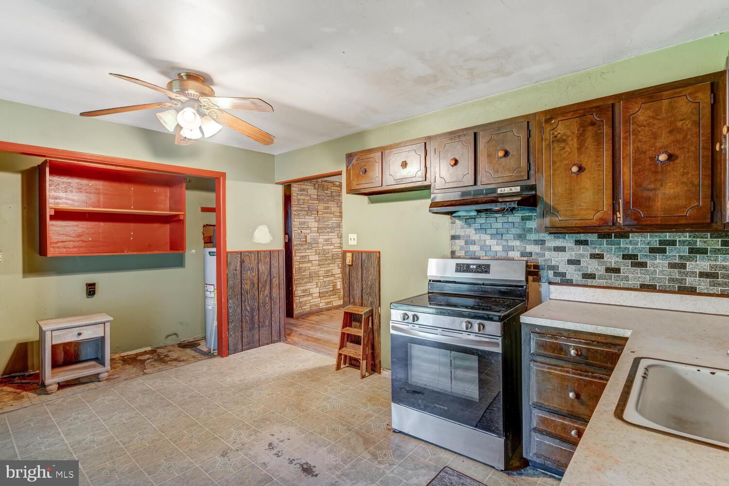 123 Jericho Road Tuckerton, NJ 08087 - Photo 13 of 29 a kitchen with stainless steel appliances granite countertop a stove and cabinets