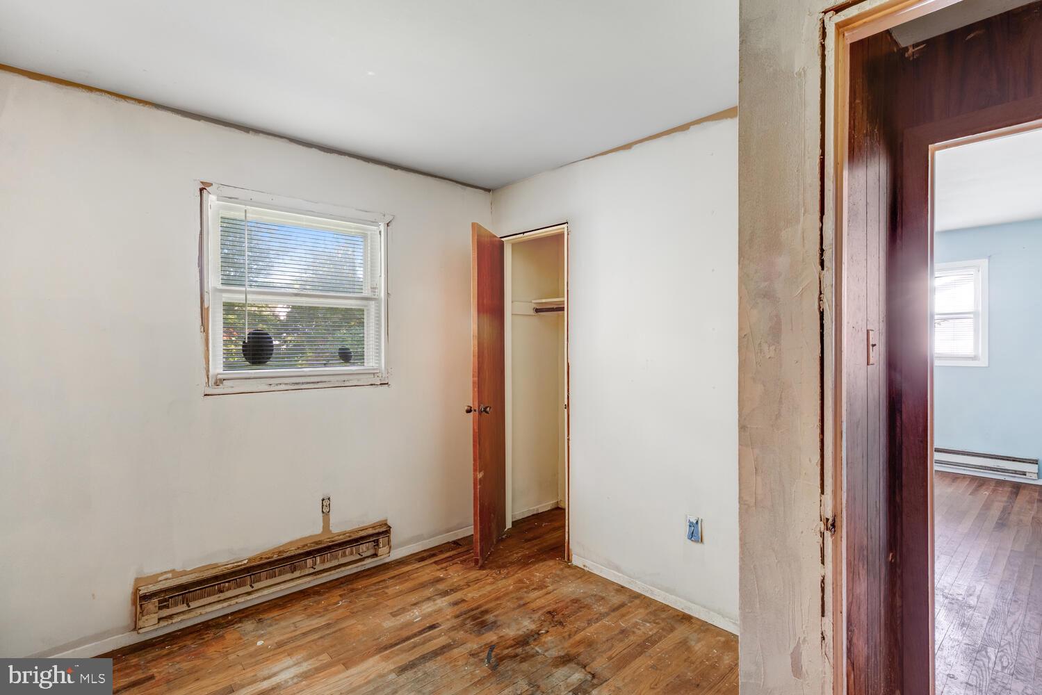 123 Jericho Road Tuckerton, NJ 08087 - Photo 17 of 29 a view of a room with wooden floor and a window