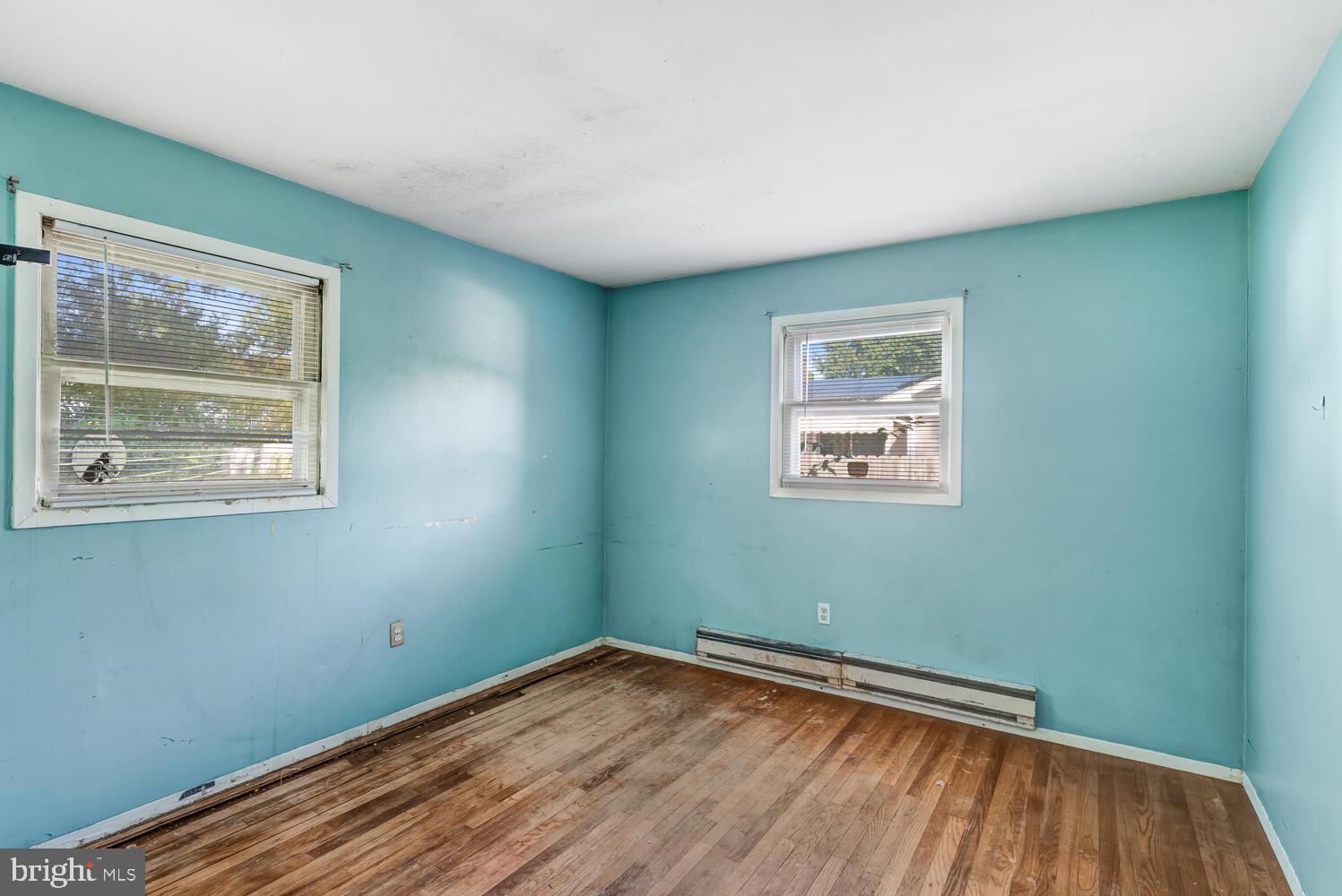 123 Jericho Road Tuckerton, NJ 08087 - Photo 18 of 29 a view of room with window and wooden floor