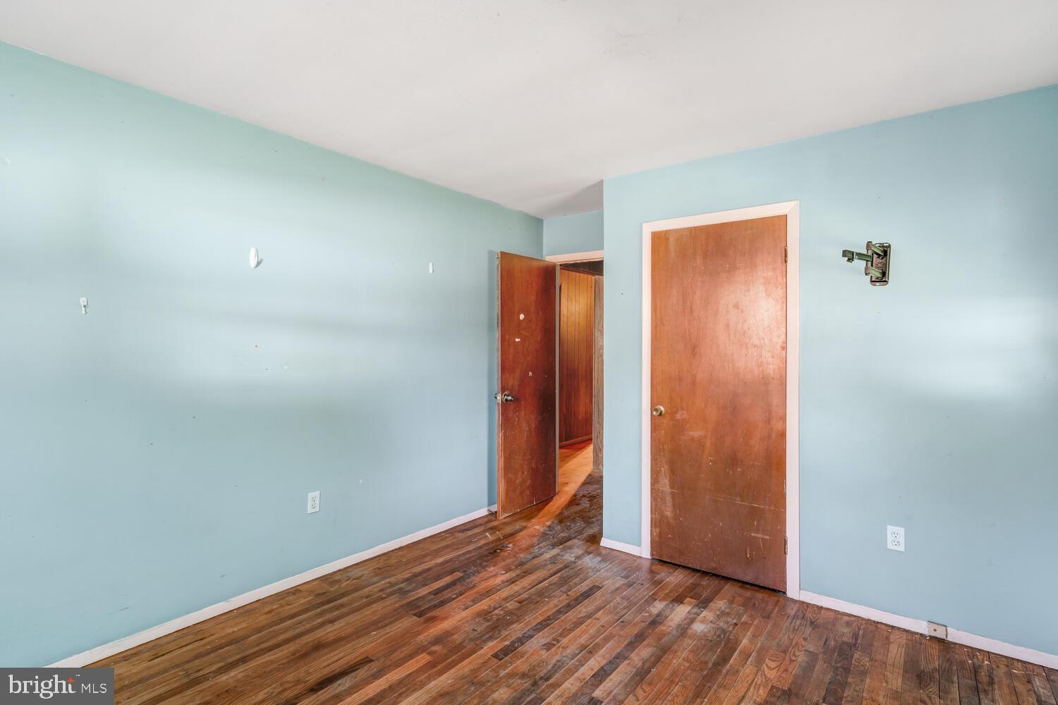 123 Jericho Road Tuckerton, NJ 08087 - Photo 20 of 29 a view of an empty room with wooden floor and closet