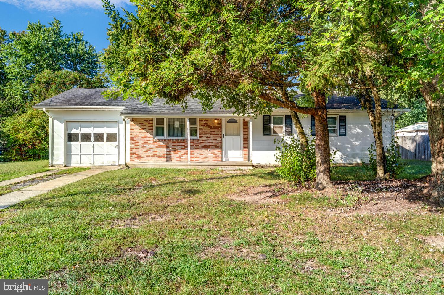 123 Jericho Road Tuckerton, NJ 08087 - Photo 2 of 29 a front view of house with yard and trees