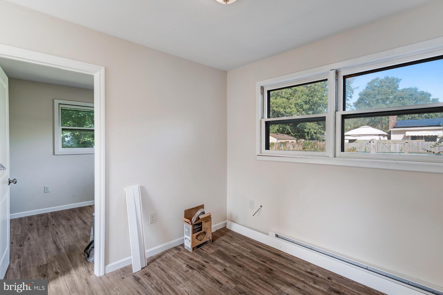 123 Jericho Road Tuckerton, NJ 08087 - Photo 23 of 29 a view of room with window and wooden floor