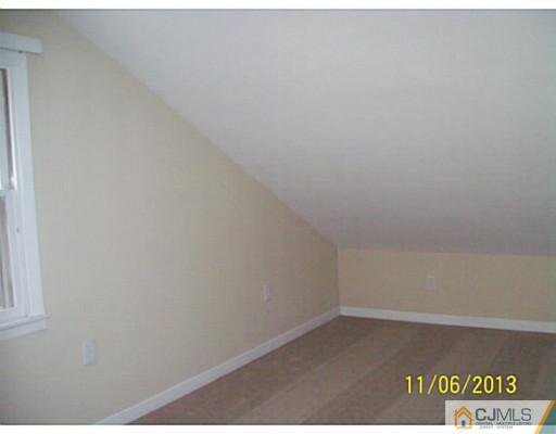 243 Walnut Street Dunellen, NJ 08812 - Photo 14 of 18 a view of an empty room
