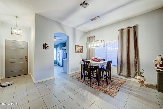 a view of a dining room with furniture