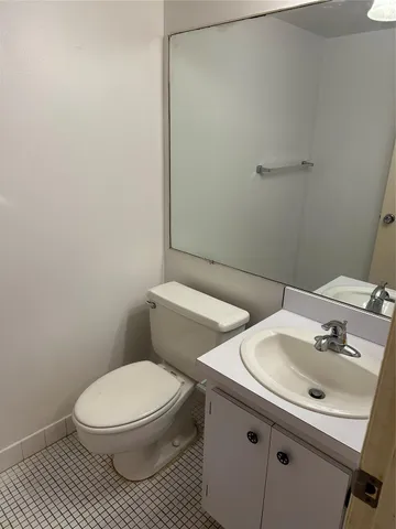 a bathroom with a sink and a toilet