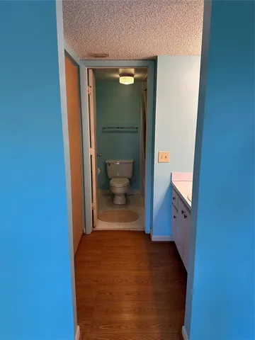 a bathroom with a sink and toilet