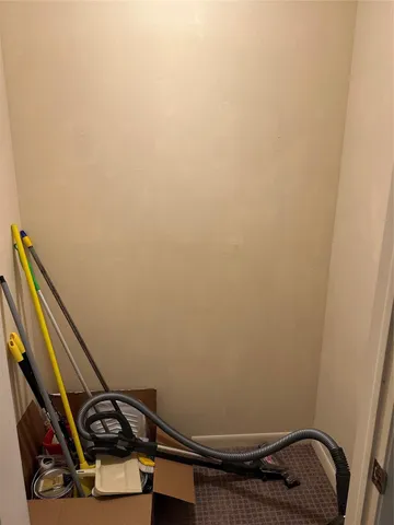 a view of a room with rack on the wall