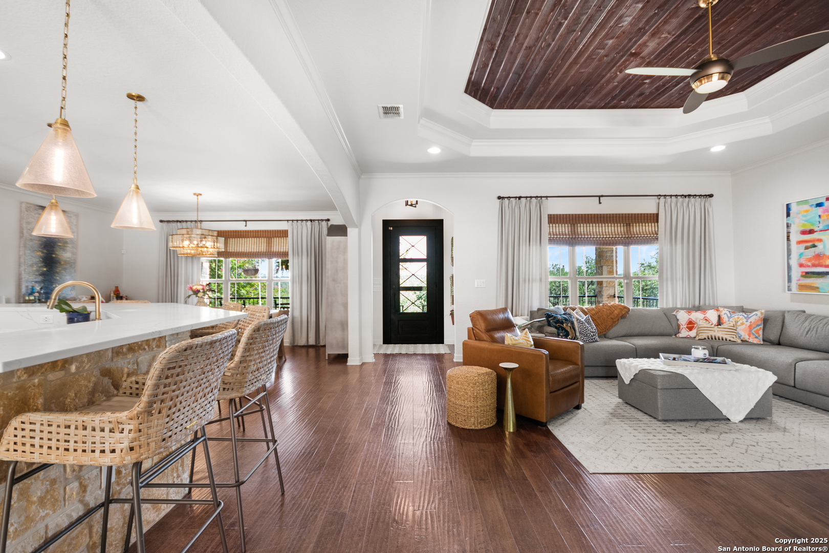 875 Shepherds Ranch Bulverde, TX 78163 - Photo 11 of 54 a living room with fireplace furniture and a wooden floor