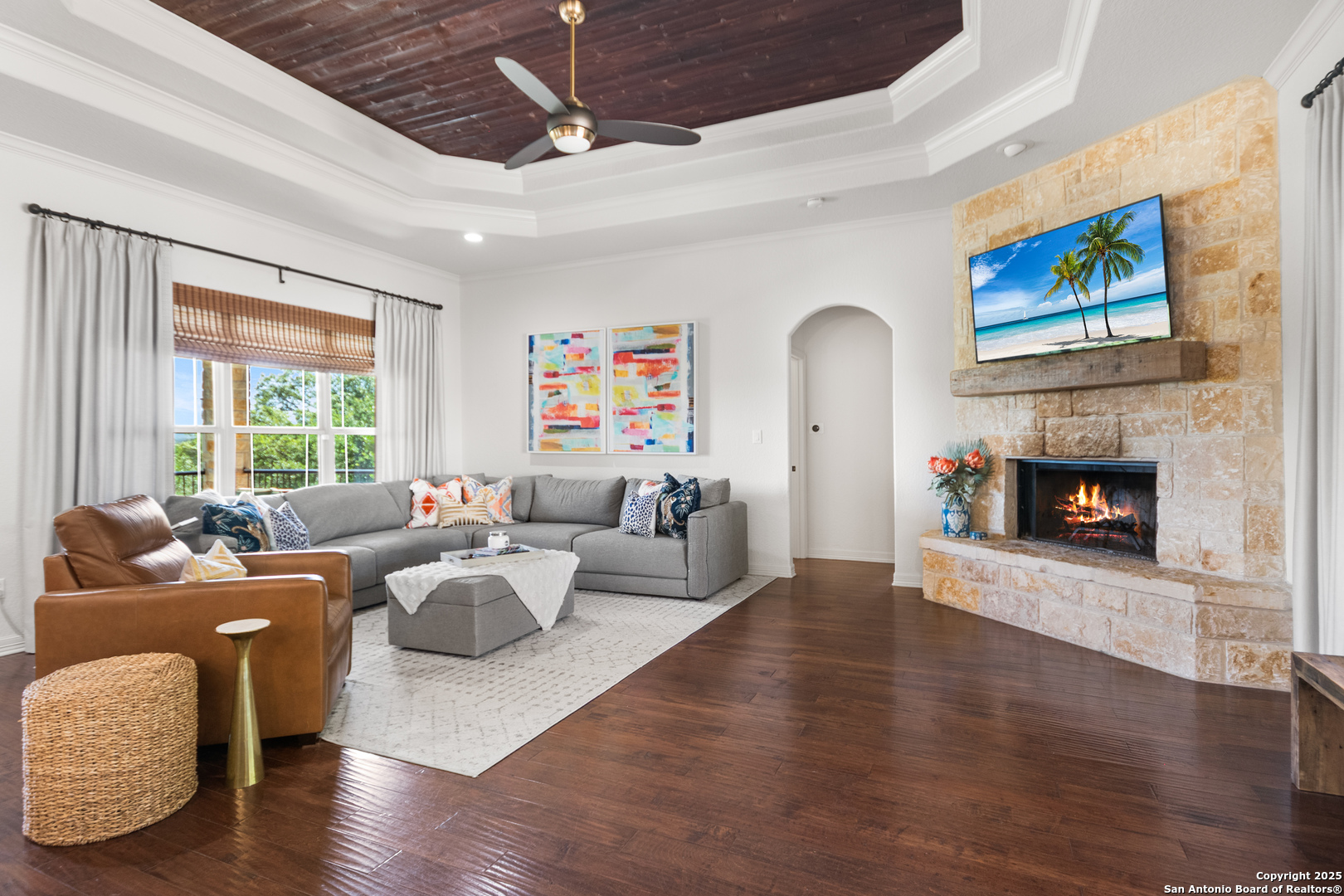 875 Shepherds Ranch Bulverde, TX 78163 - Photo 14 of 54 a living room with furniture fireplace and a large window