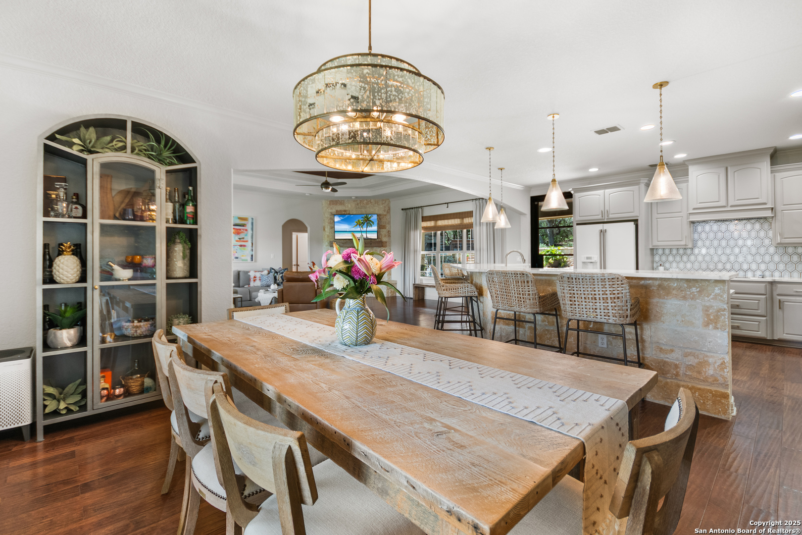 875 Shepherds Ranch Bulverde, TX 78163 - Photo 26 of 54 a view of a dining room with furniture and wooden floor