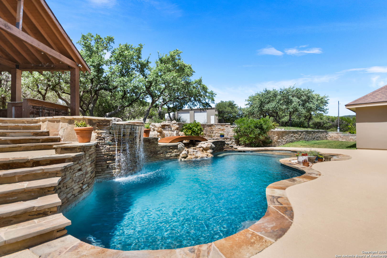 875 Shepherds Ranch Bulverde, TX 78163 - Photo 40 of 54 a view of swimming pool and lounge chair