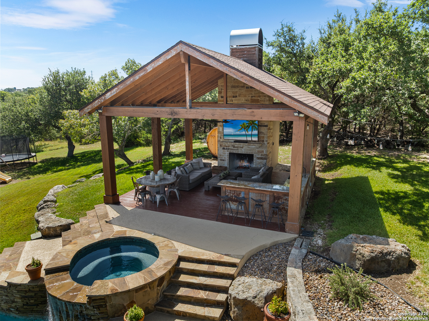 875 Shepherds Ranch Bulverde, TX 78163 - Photo 41 of 54 a front view of house with outdoor seating and yard