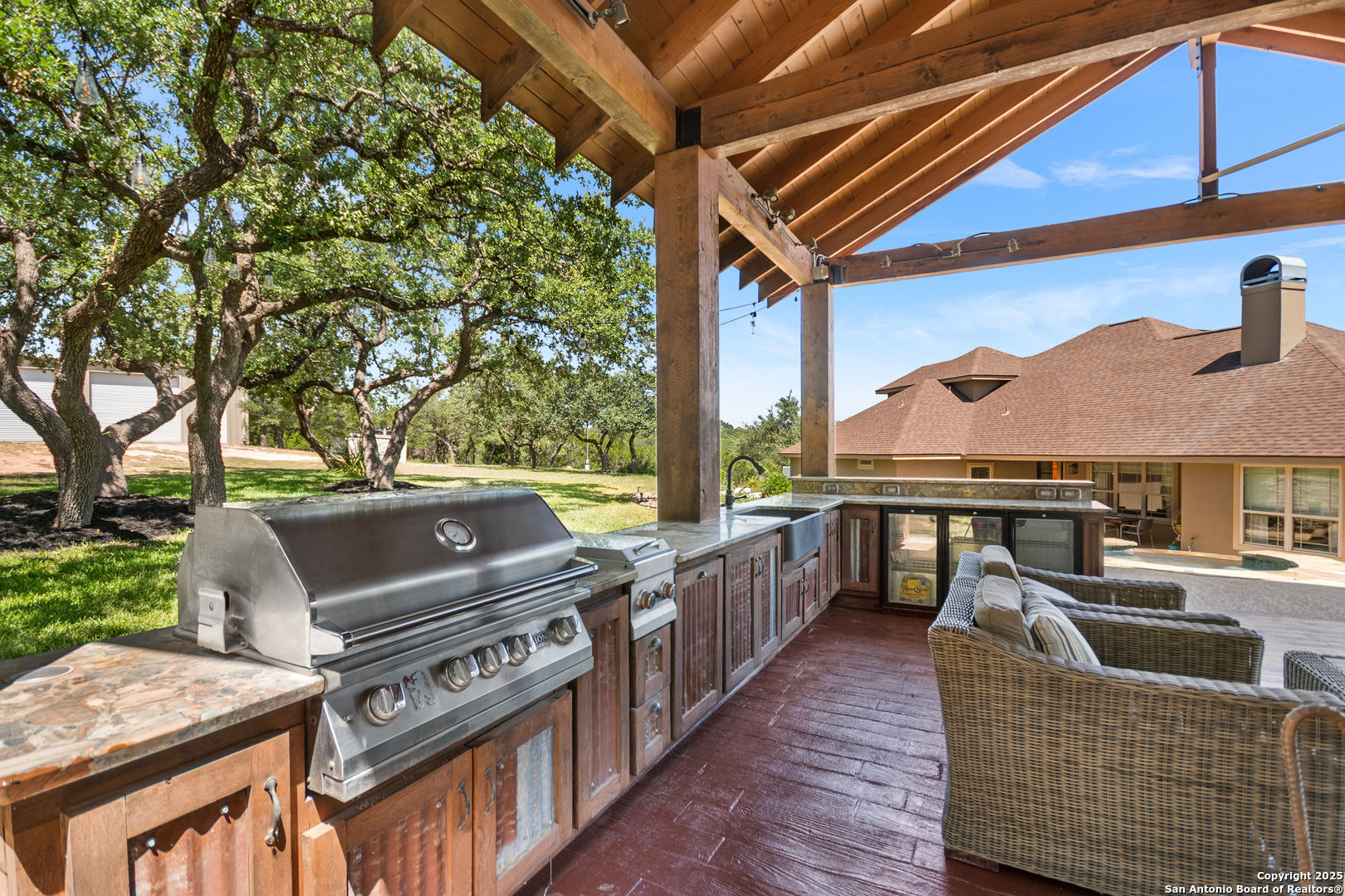 875 Shepherds Ranch Bulverde, TX 78163 - Photo 43 of 54 a view of a patio with couches next to a yard
