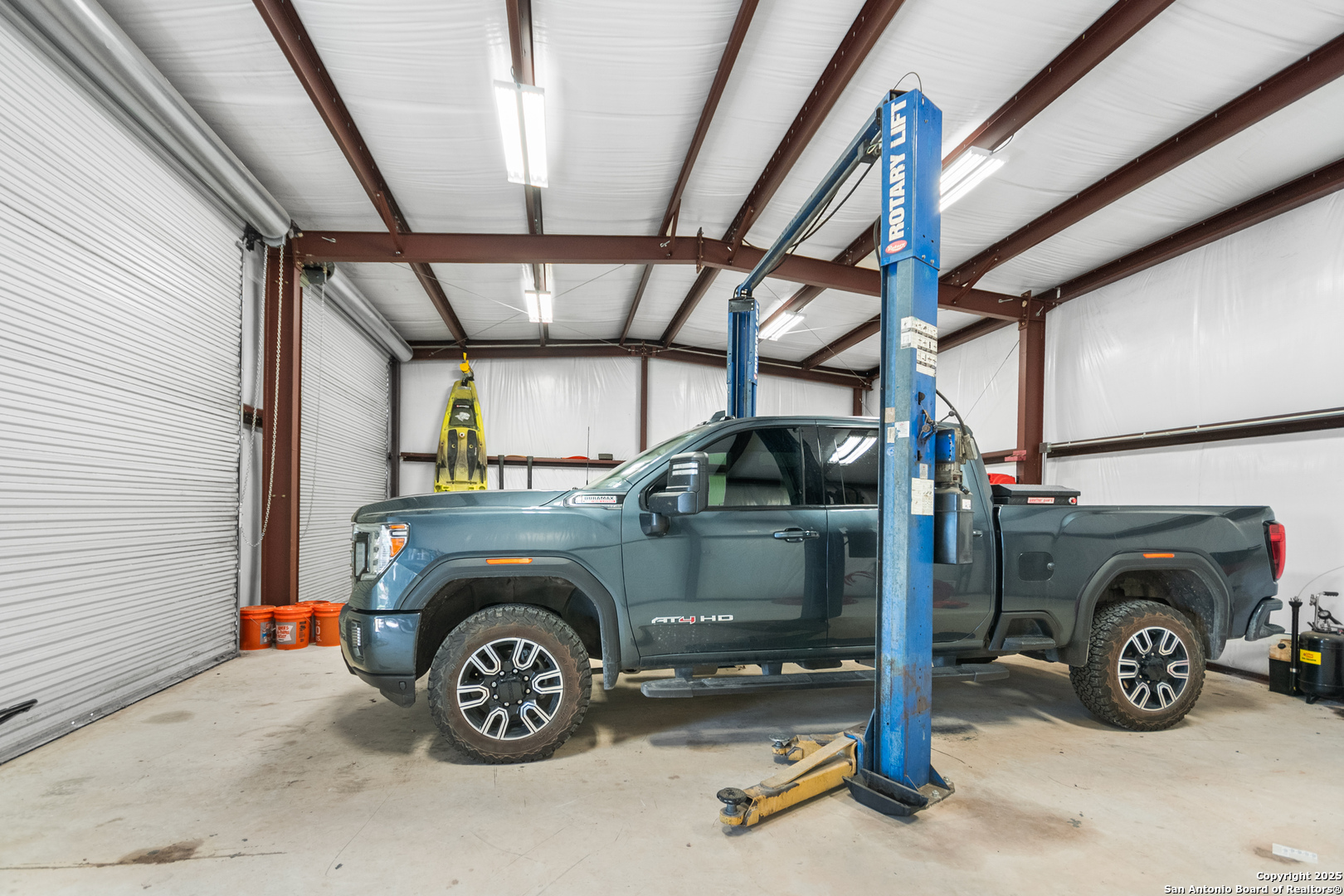 875 Shepherds Ranch Bulverde, TX 78163 - Photo 49 of 54 a view of parking garage with cars
