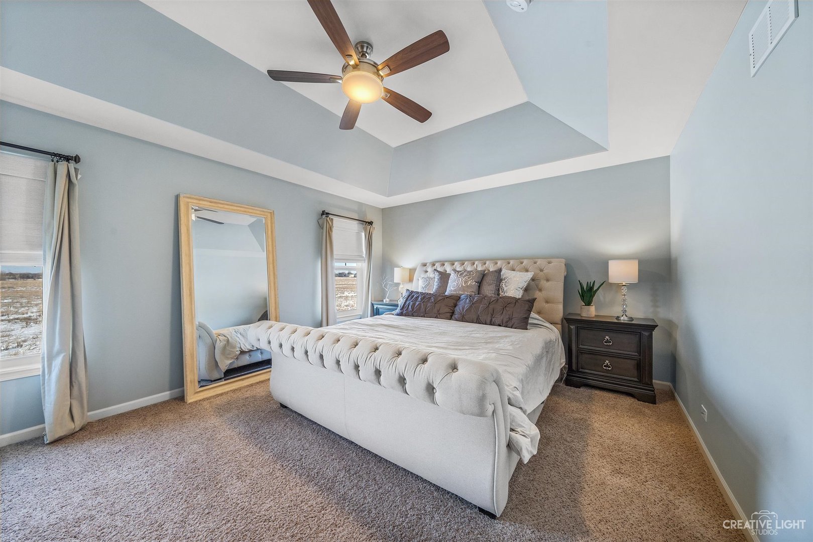 3806 Monterey Circle Algonquin, IL 60102 - Photo 15 of 33 a bedroom with a bed and a chandelier