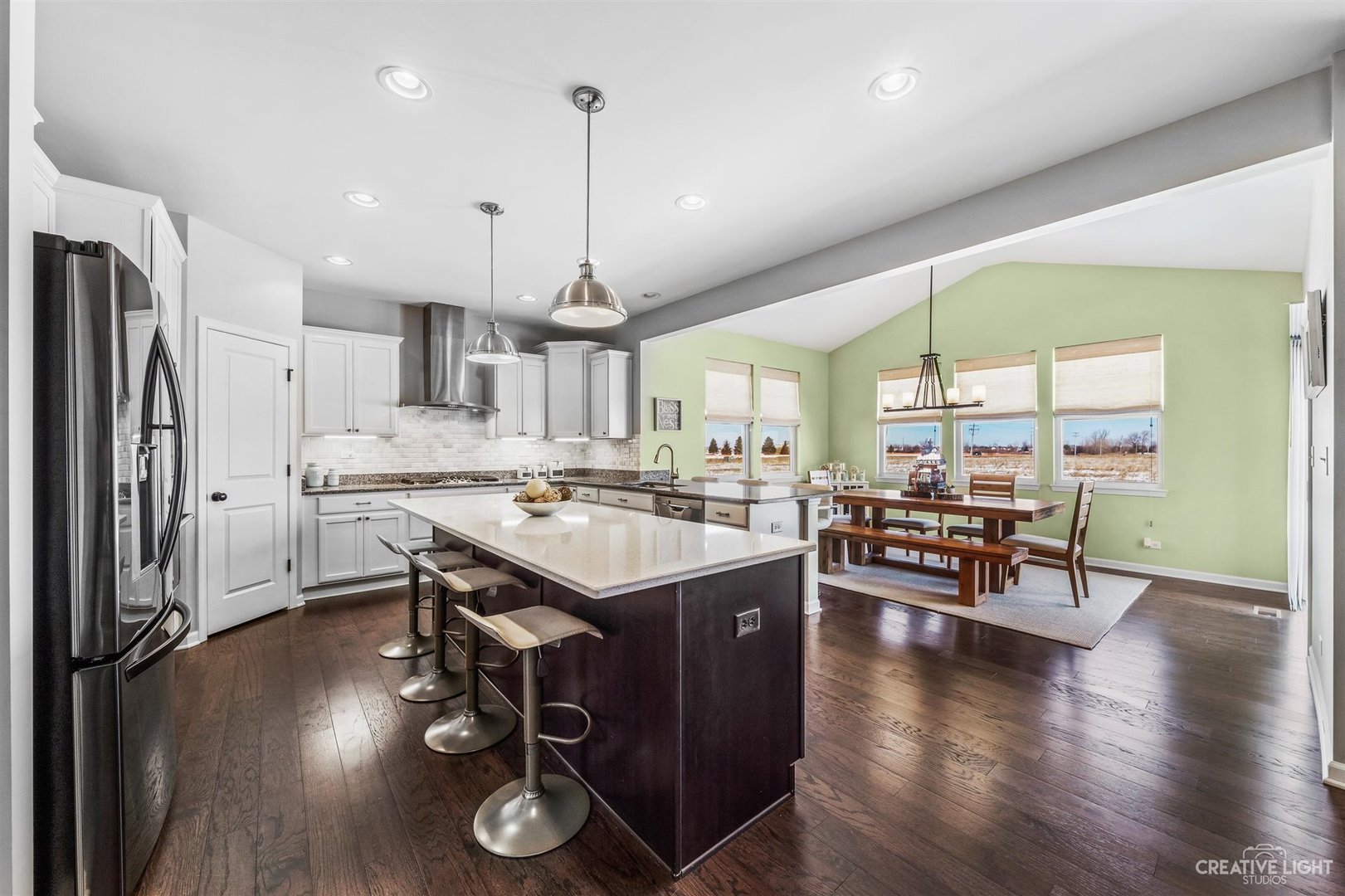 3806 Monterey Circle Algonquin, IL 60102 - Photo 4 of 33 a kitchen with stainless steel appliances granite countertop a sink a stove and a refrigerator