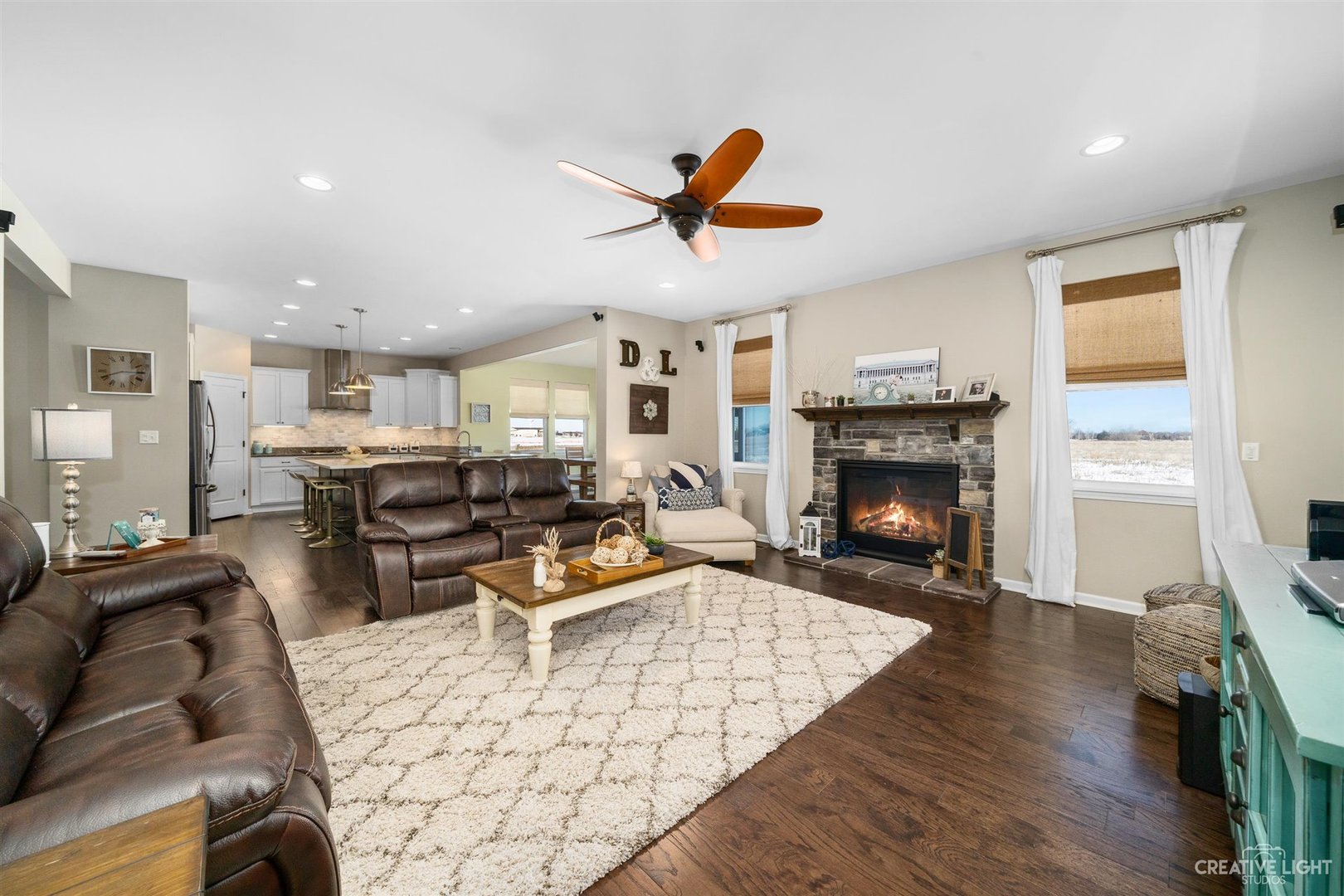 3806 Monterey Circle Algonquin, IL 60102 - Photo 9 of 33 a living room with furniture a fireplace and a table