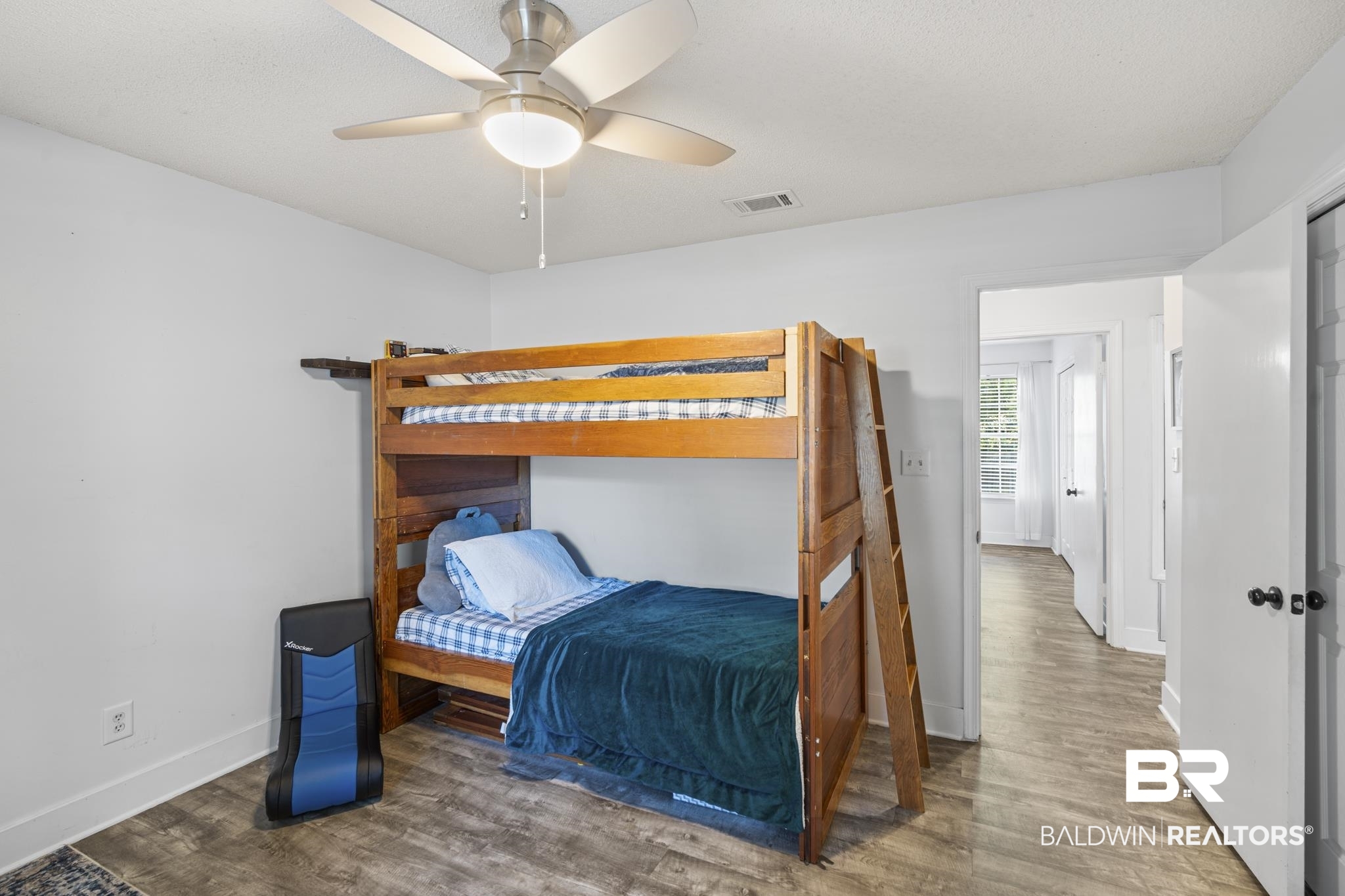117 Richmond Road Daphne, AL 36526 - Photo 28 of 41 Bedroom with vinyl floors, baseboards, and ceiling fan