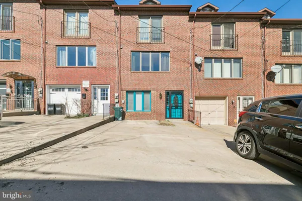 a car parked in front of a building