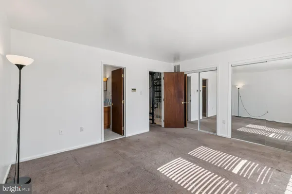 an empty room with windows