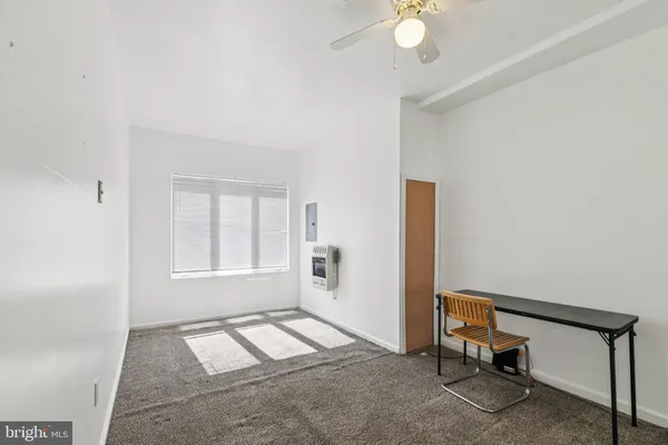 a view of a livingroom with furniture