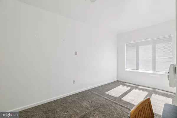 a bathroom with a shower and sink