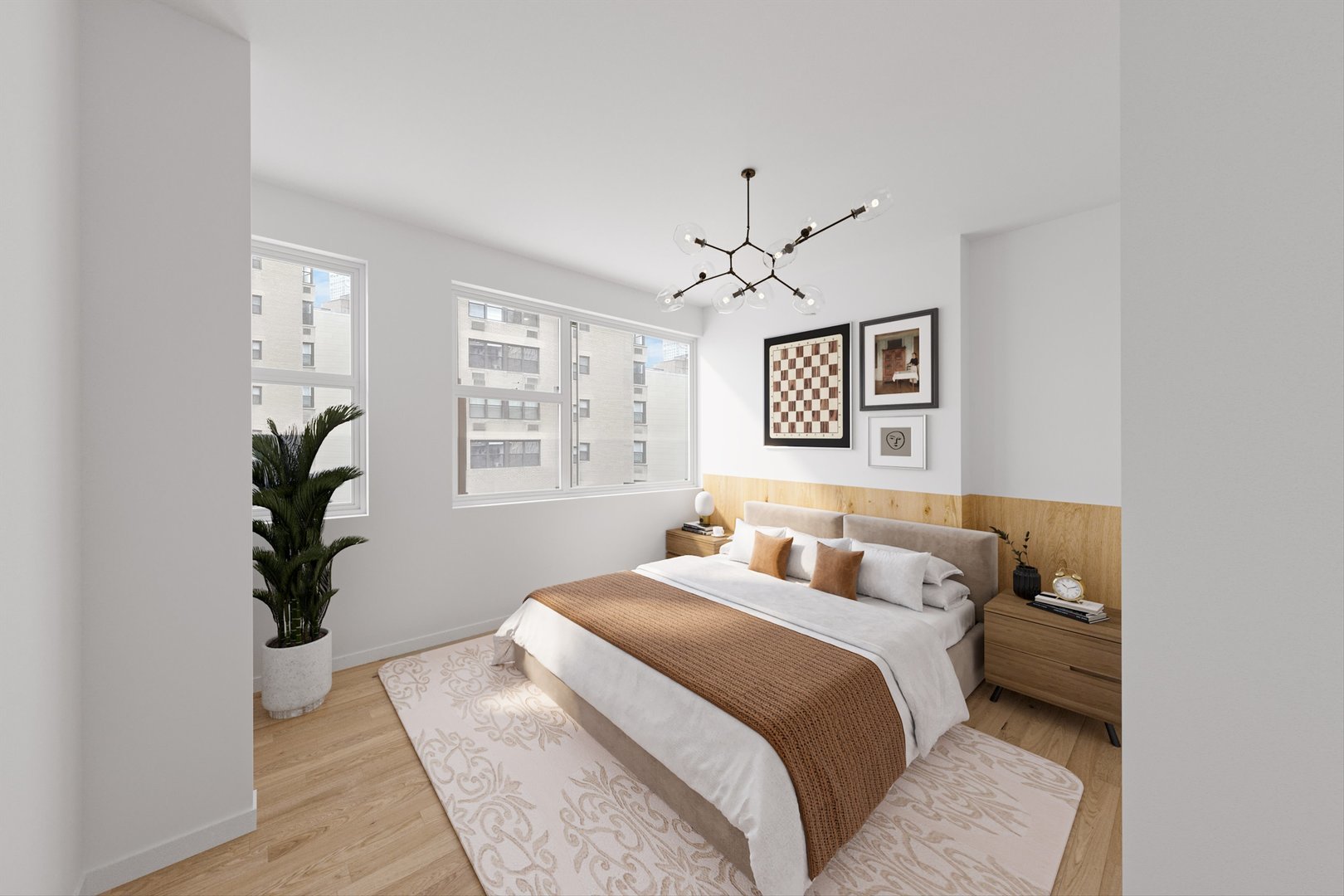 247 East Chestnut Street, Unit 2004 Chicago, IL 60611 - Photo 8 of 16 a bedroom with a large bed and a chandelier