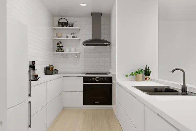 a kitchen with stainless steel appliances a sink stove and refrigerator