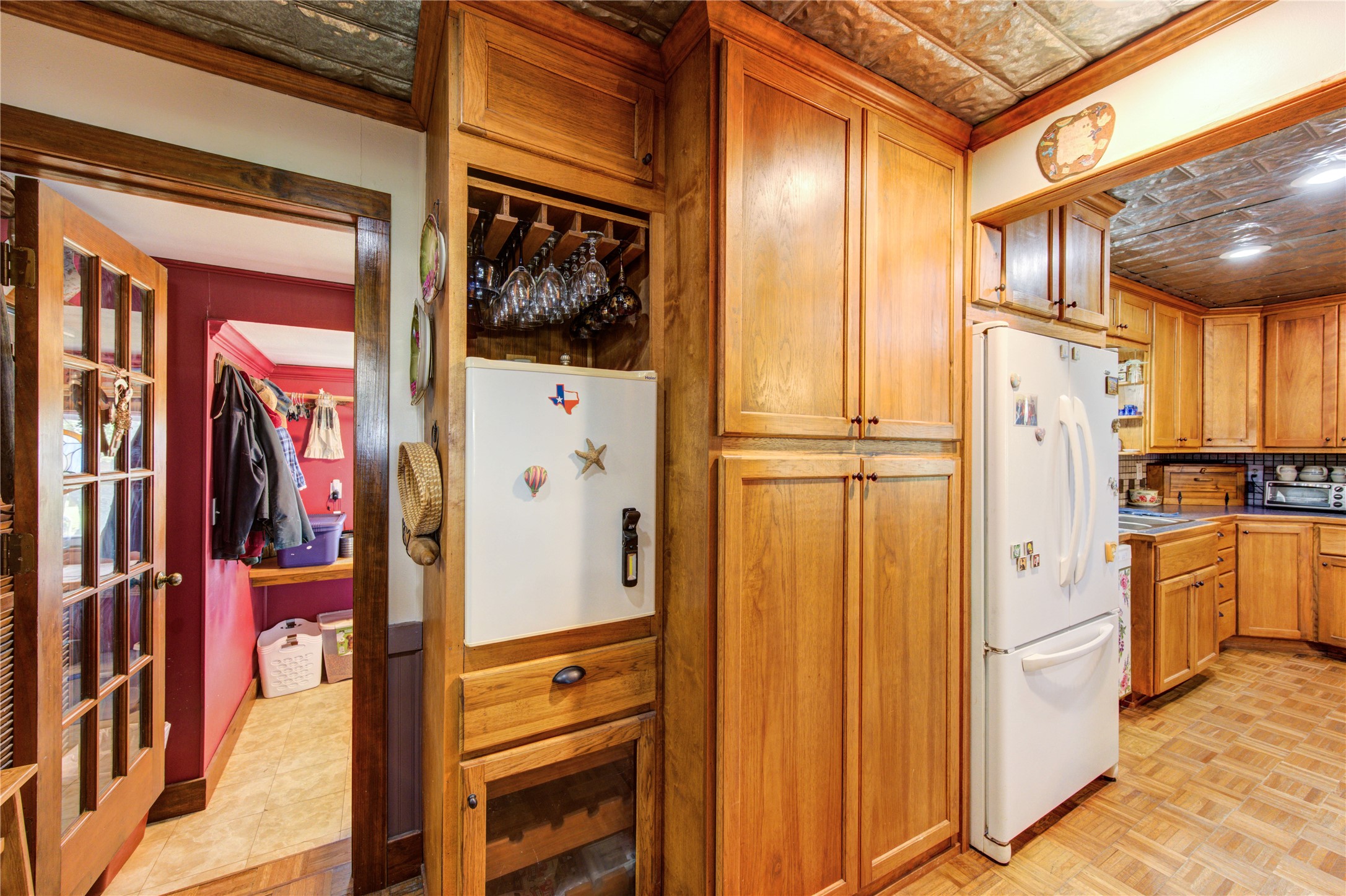 36239 Cochran Road Waller, TX 77484 - Photo 7 of 9 a view of walk in closet with clothes and shoes