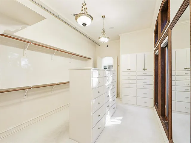 a bathroom with a shower and a sink