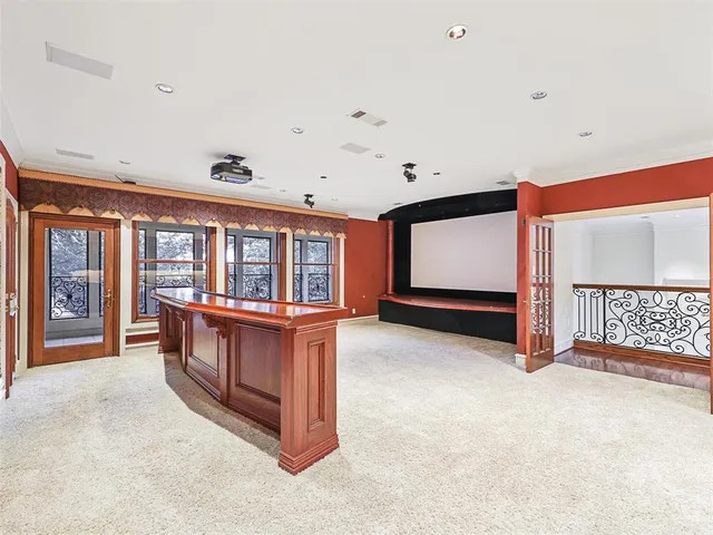 a view of an empty room with a fireplace