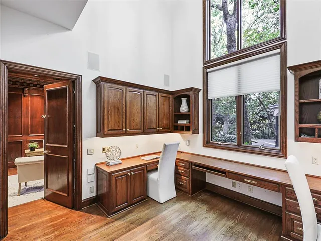 a kitchen view with wooden cabinets and stainless steel appliances