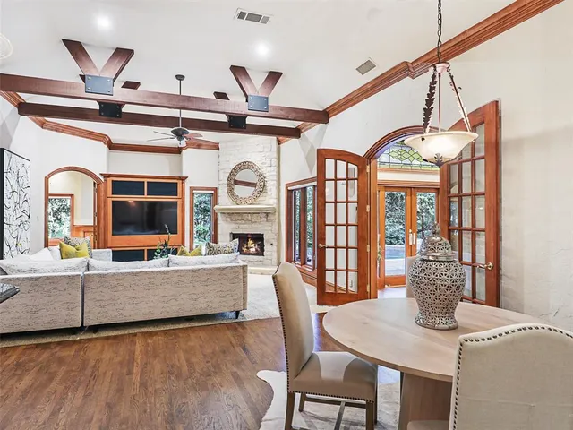 a view of a kitchen with a sink and furniture