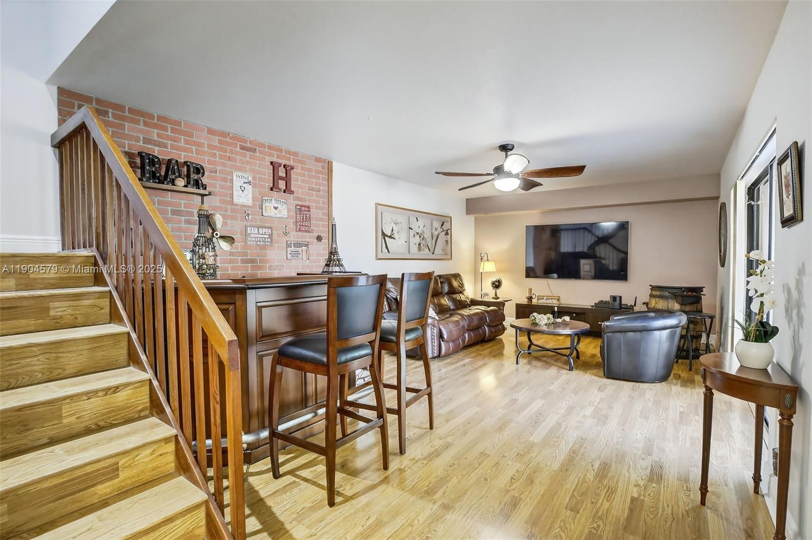 9927 Northwest 6th Place Plantation, FL 33324 - Photo 12 of 43 a view of a dining room with furniture window and wooden floor