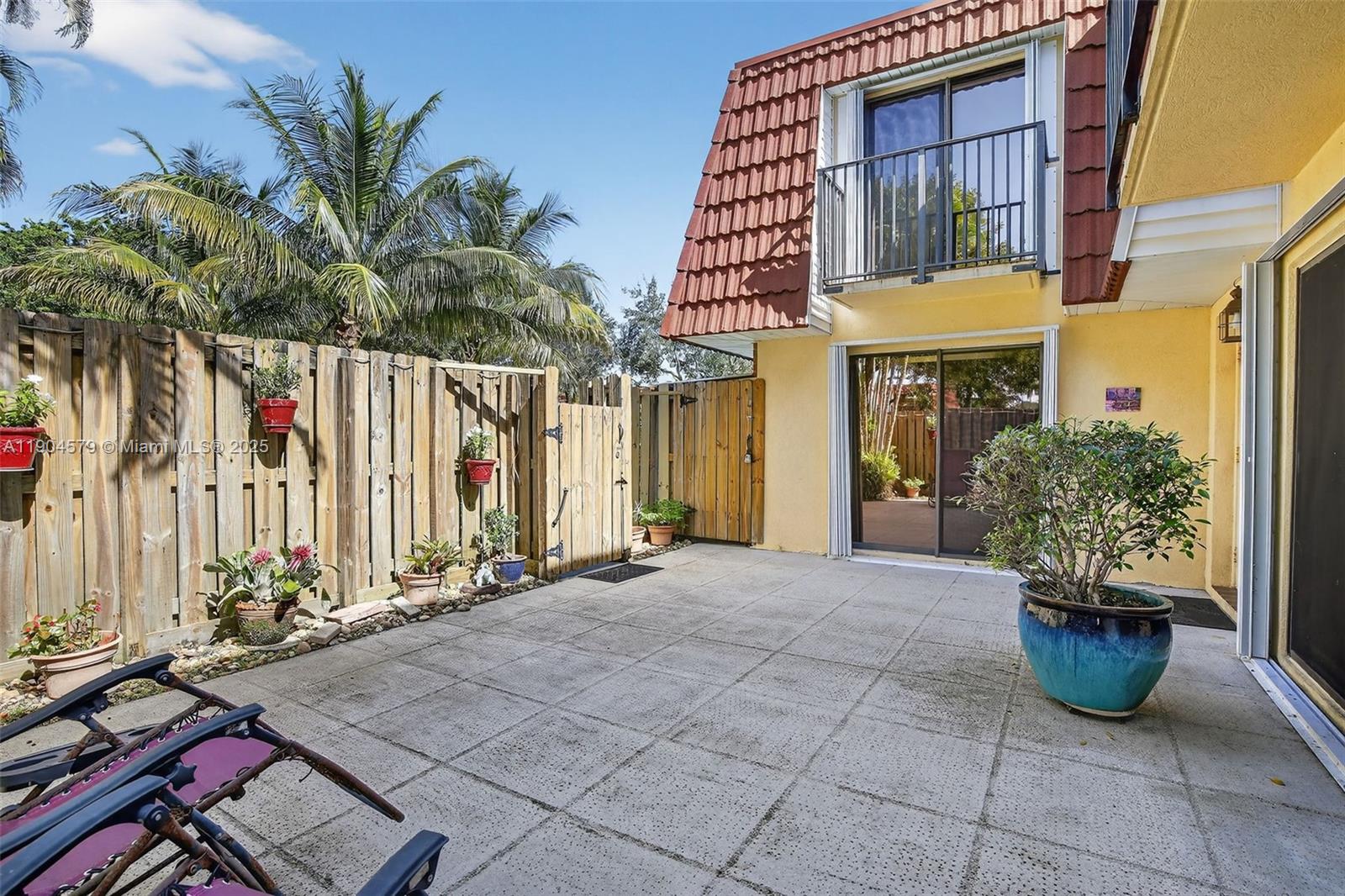 9927 Northwest 6th Place Plantation, FL 33324 - Photo 34 of 43 a view of a house with backyard and sitting area