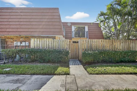 a view of a backyard with a garden