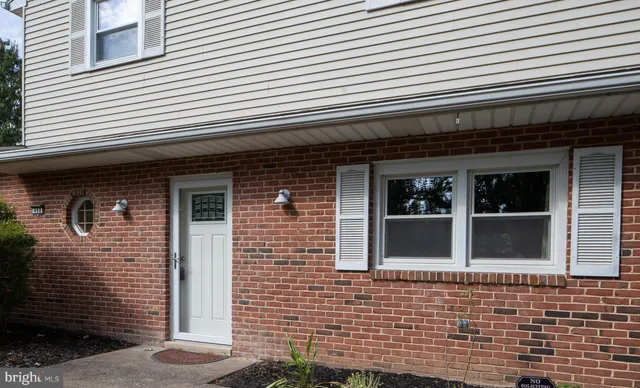 a front view of a house with a garage