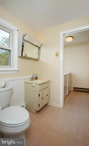 a view of a room that has a window